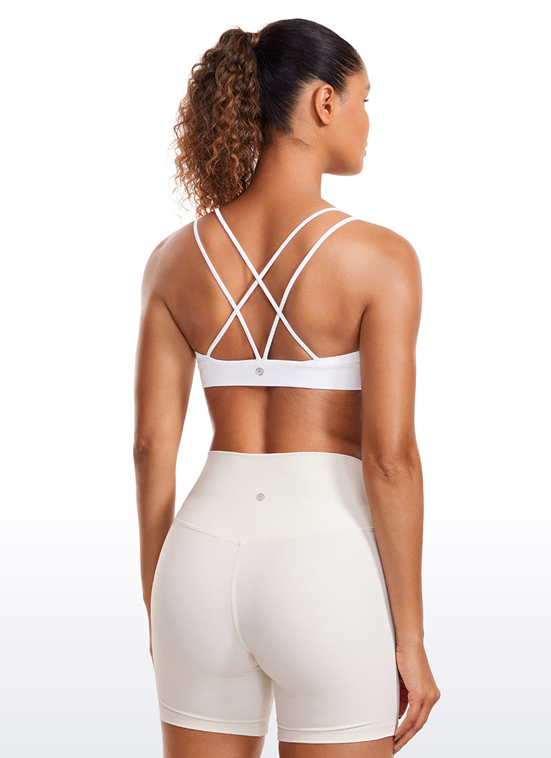 حمالة صدر لليوغا Butterluxe بدعم خفيف وأشرطة في الخلف للنساء من CRZ YOGA باللون الأبيض