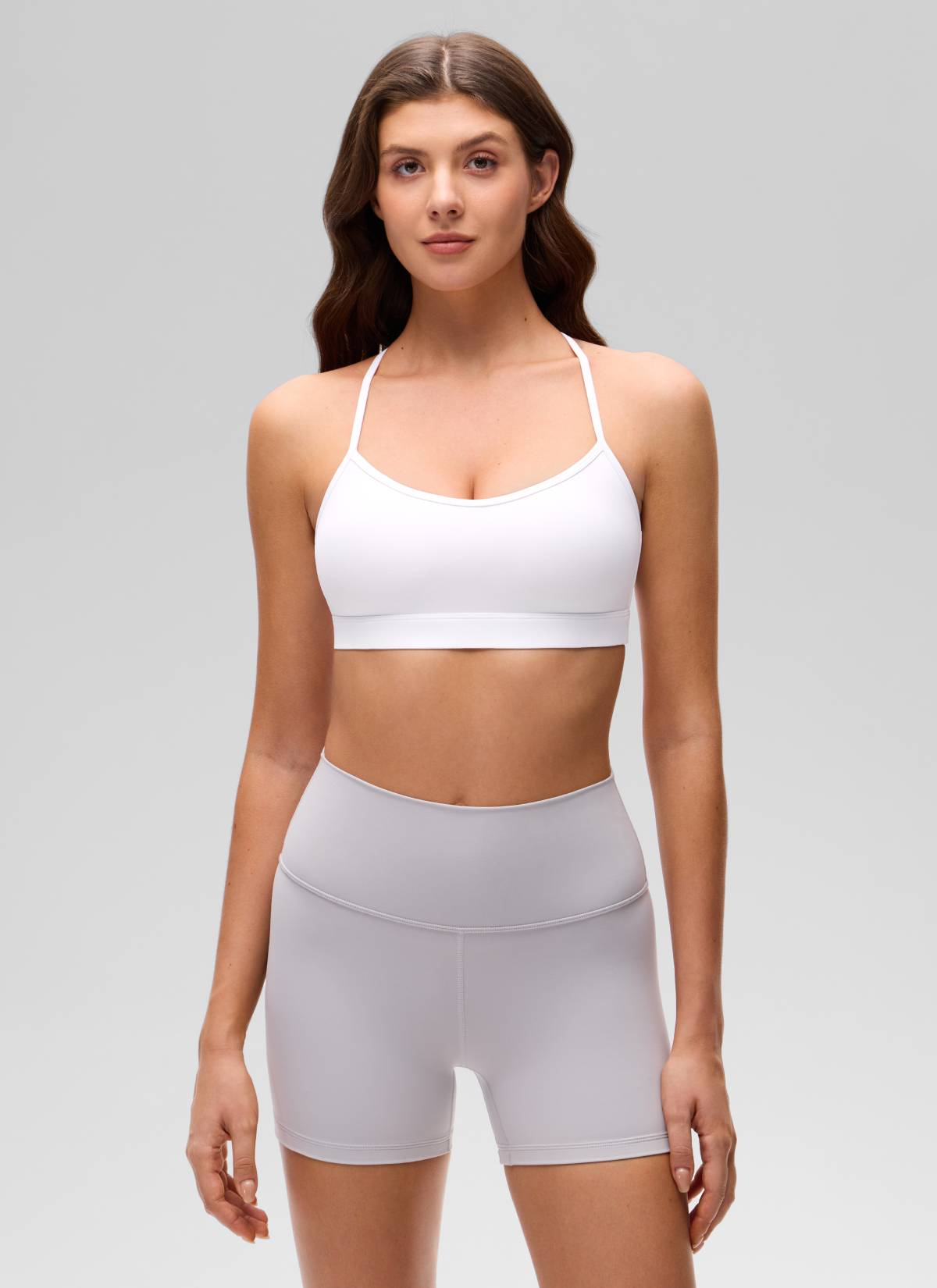 حمالة صدر رياضية يوغا Butterluxe برقبة على شكل حرف U وتصميم متقاطع من الخلف للنساء من CRZ YOGA باللون الأبيض