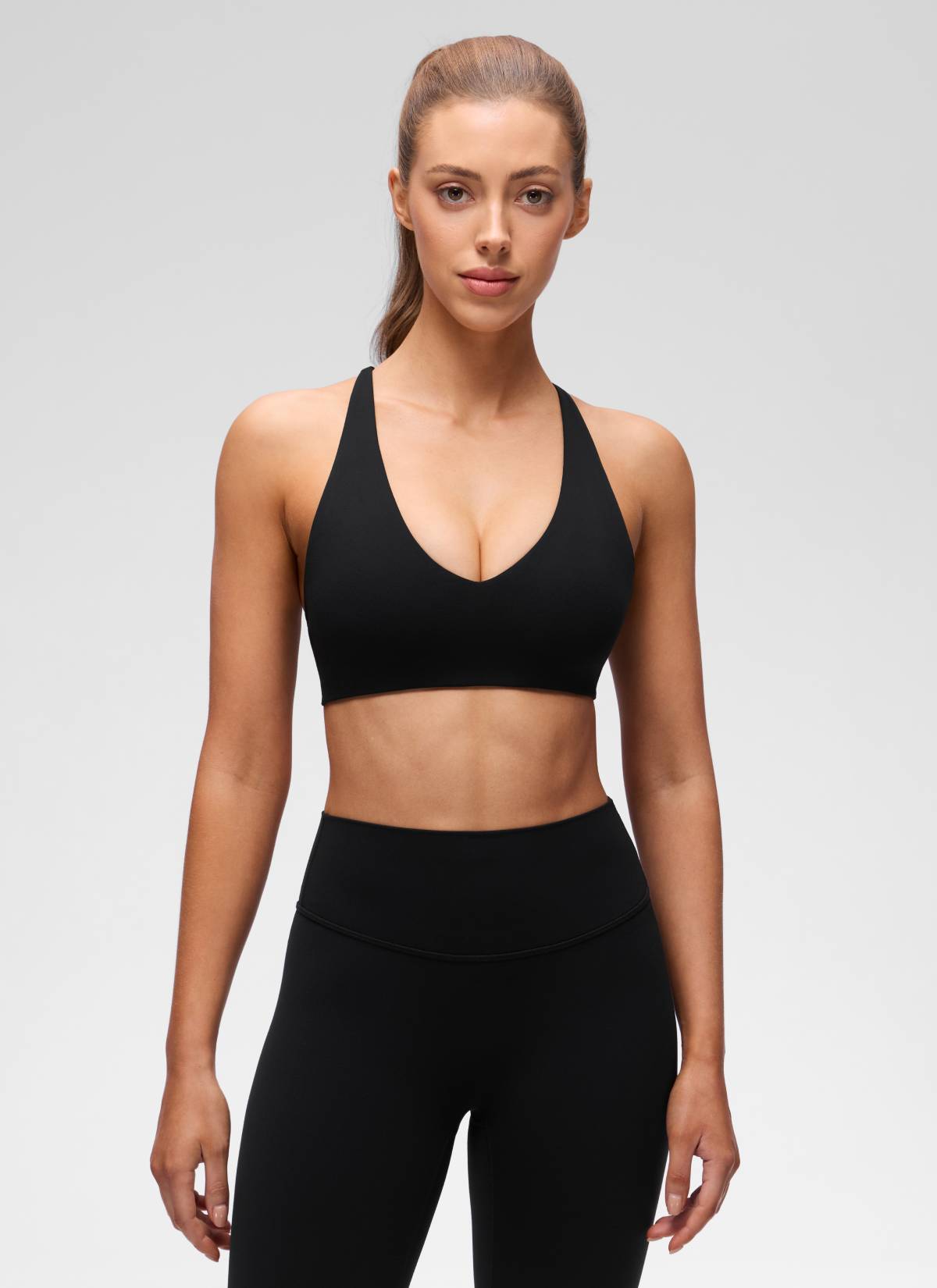 حمالة صدر رياضية Butterluxe لليوغا بقبة V وتصميم خلفي متقاطع وملتف للنساء من CRZ YOGA بلون أسود