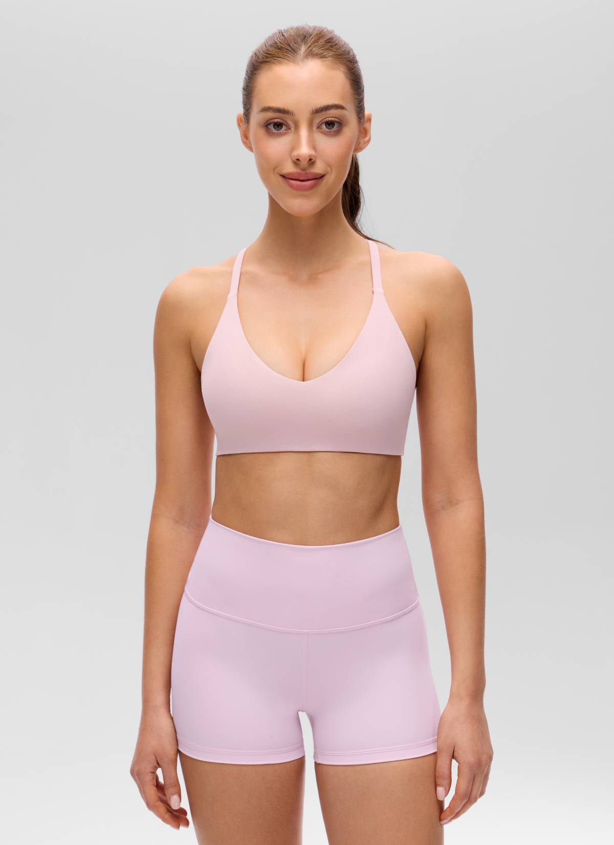 حمالة صدر رياضية نسائية Butterluxe بفتحة رقبة على شكل V وحمالات رفيعة وتصميم Racerback من CRZ YOGA بلون بينك هايز