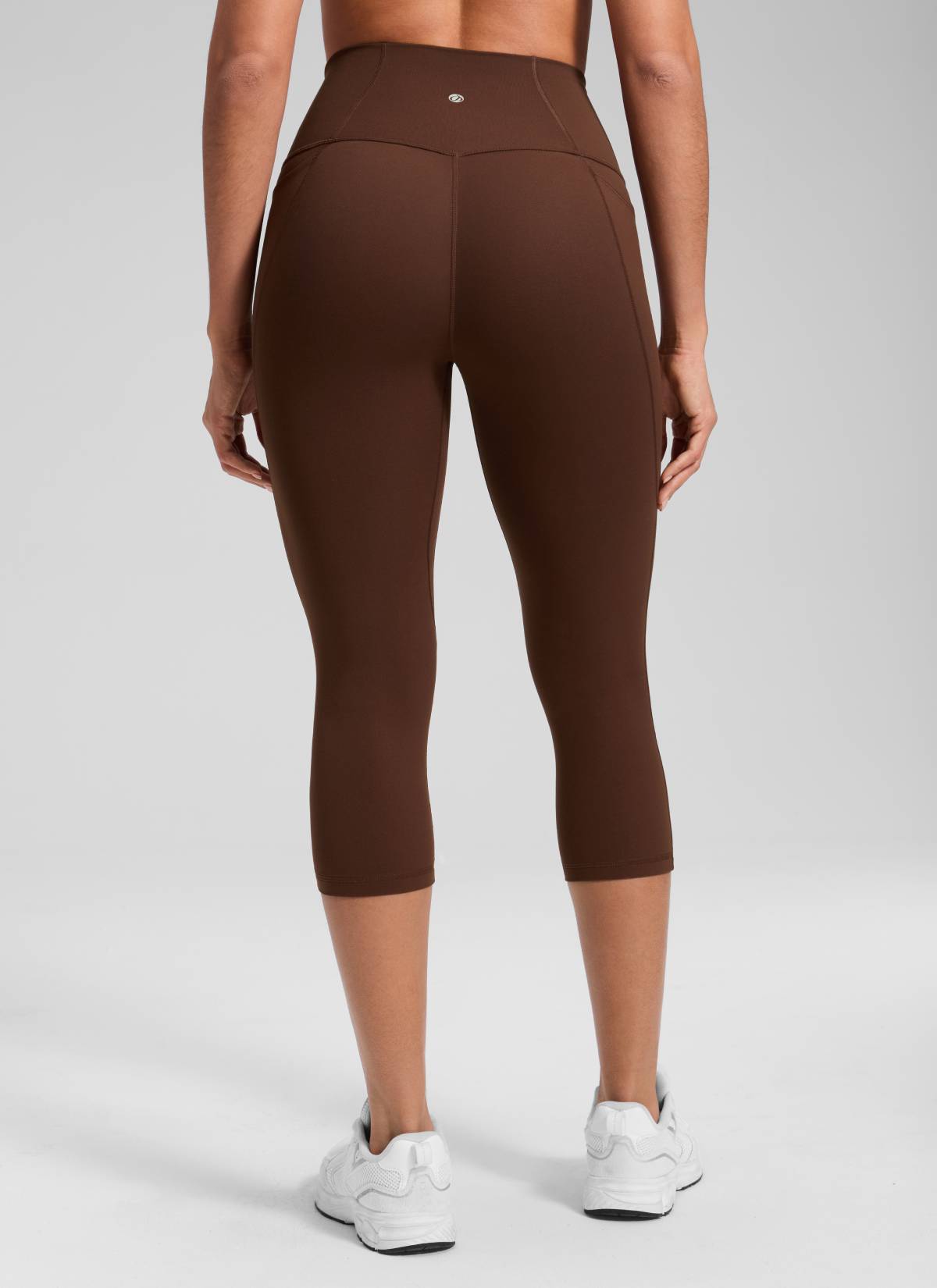 CRZ YOGA - ليغينغز نسائي بخصر Butterluxe وجيوب Butterluxe بطول كابري 19 بوصة، لون بني لافا
