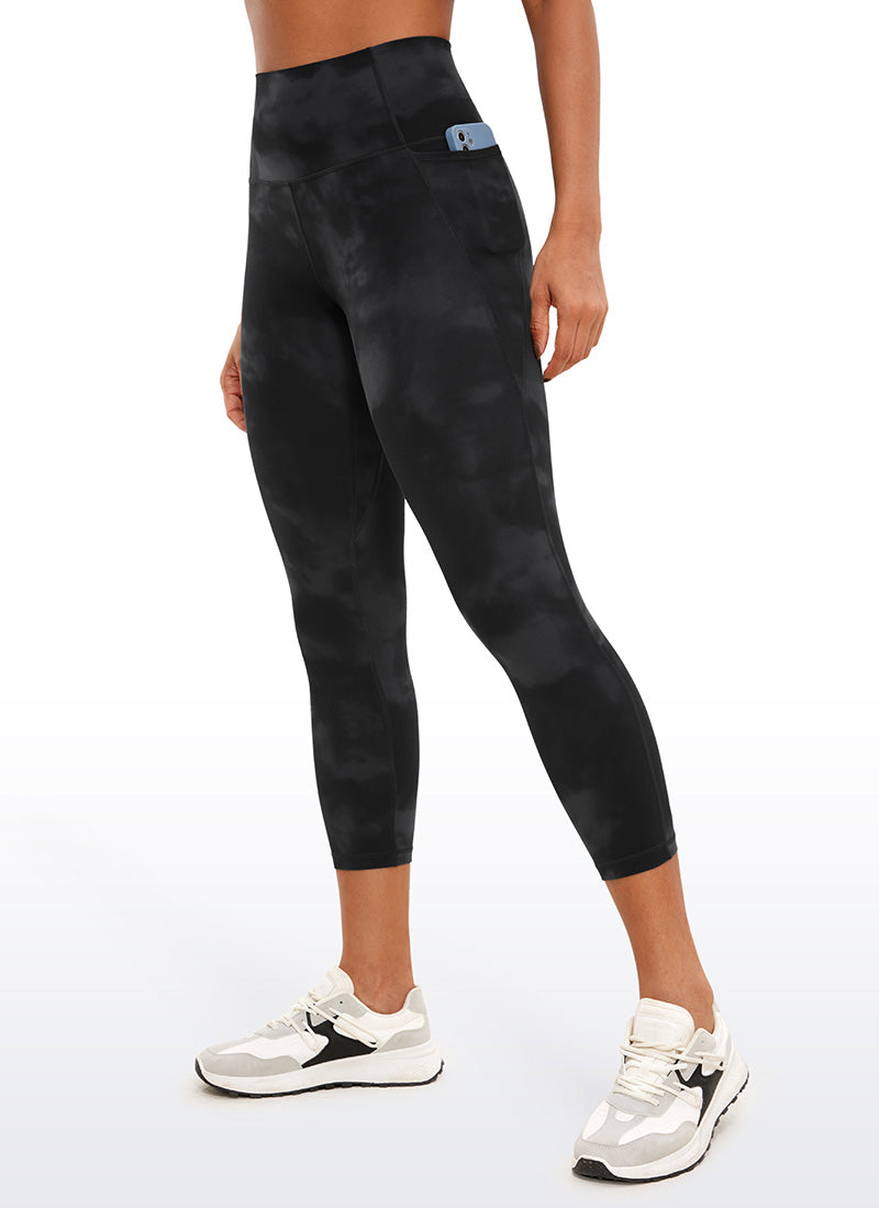 CRZ YOGA - ليغينغز نسائي بخصر Butterluxe وجيوب من طراز Butterluxe بطول كابري، 23 بوصة، أسود، بنقشة أزهار «Tie Dye»