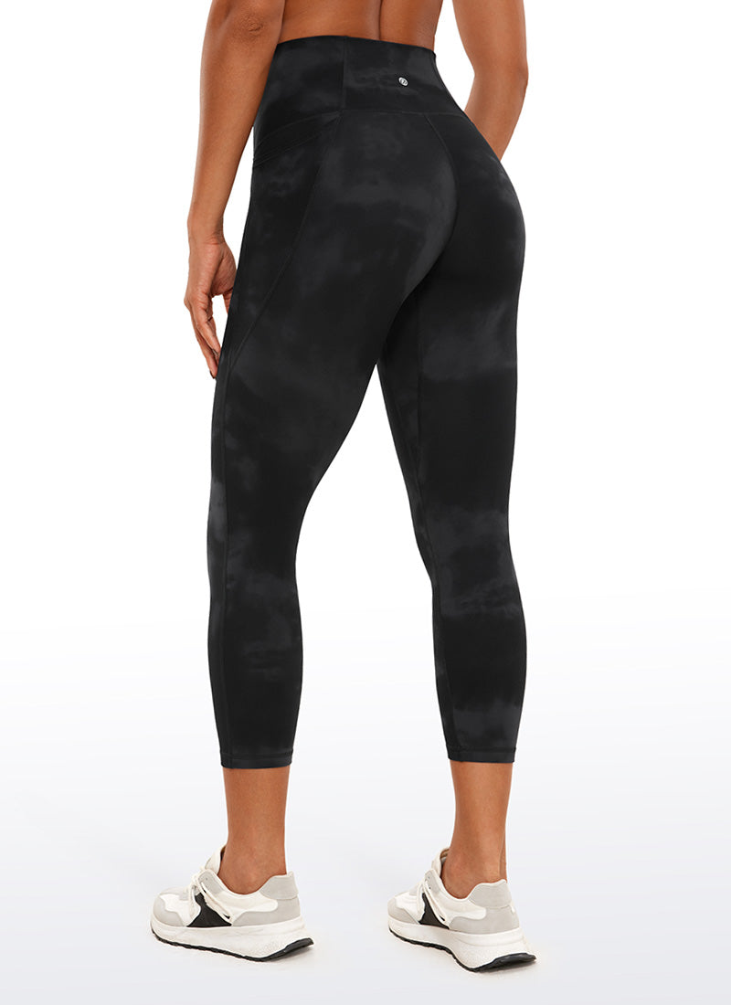 CRZ YOGA - ليغينغز نسائي بخصر Butterluxe وجيوب من طراز Butterluxe بطول كابري، 23 بوصة، أسود، بنقشة أزهار «Tie Dye»