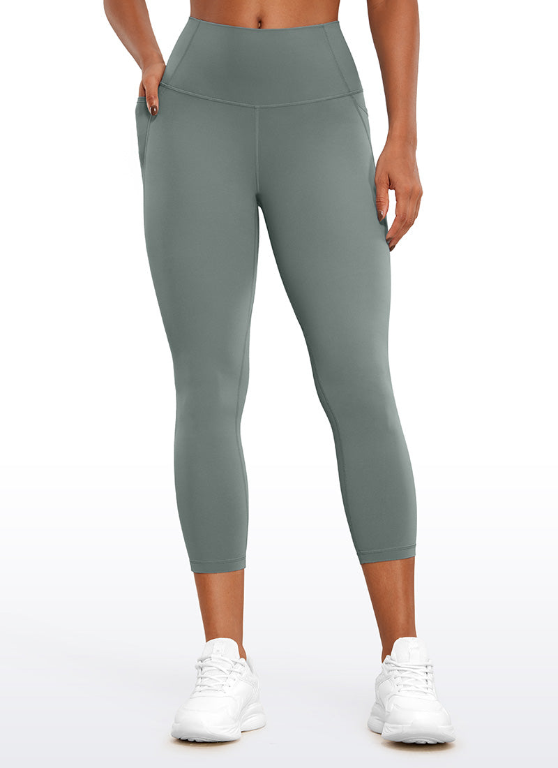 CRZ YOGA - ليغينغز نسائي بخصر Butterluxe وجيوب Butterluxe طراز Butterluxe بطول كابري، 23 بوصة، رمادي مخضر