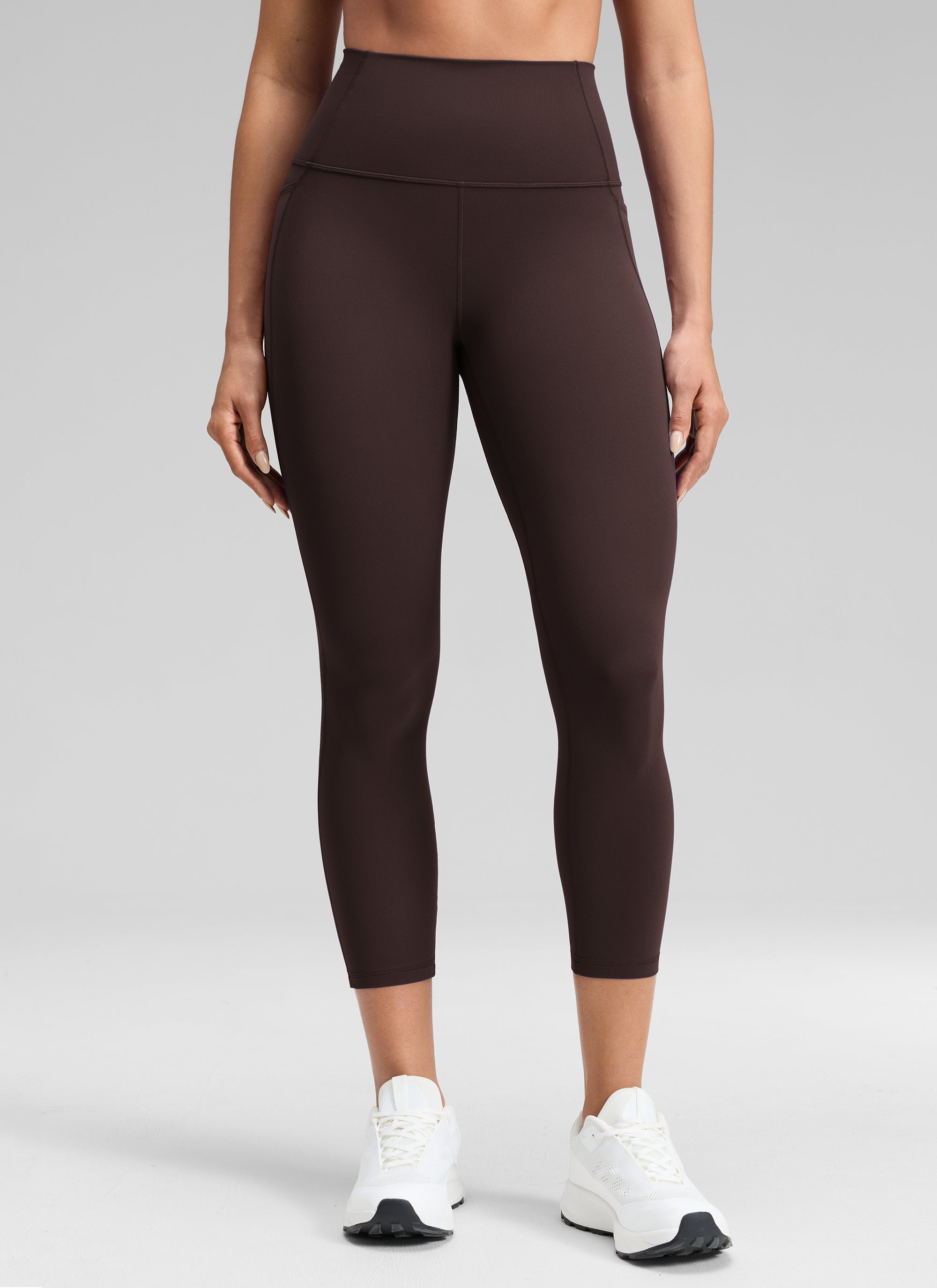 CRZ YOGA - ليغينغز نسائي بخصر Butterluxe وجيوب Butterluxe بطول كابري 23 بوصة، لون بني داكن