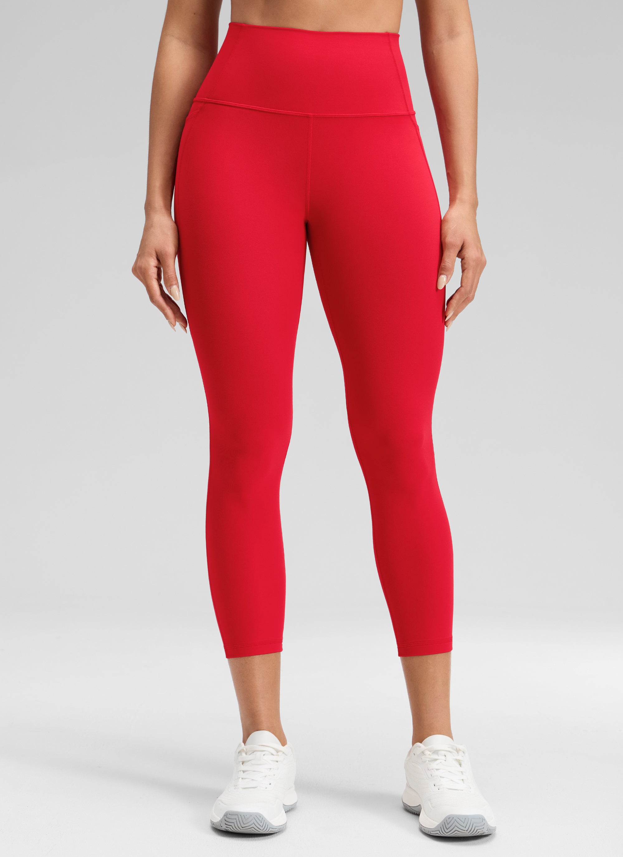 CRZ YOGA - ليغينغز نسائي بخصر Butterluxe وجيوب Butterluxe ط Butterluxe بطول كابري 23 بوصة، لون أحمر أورورا