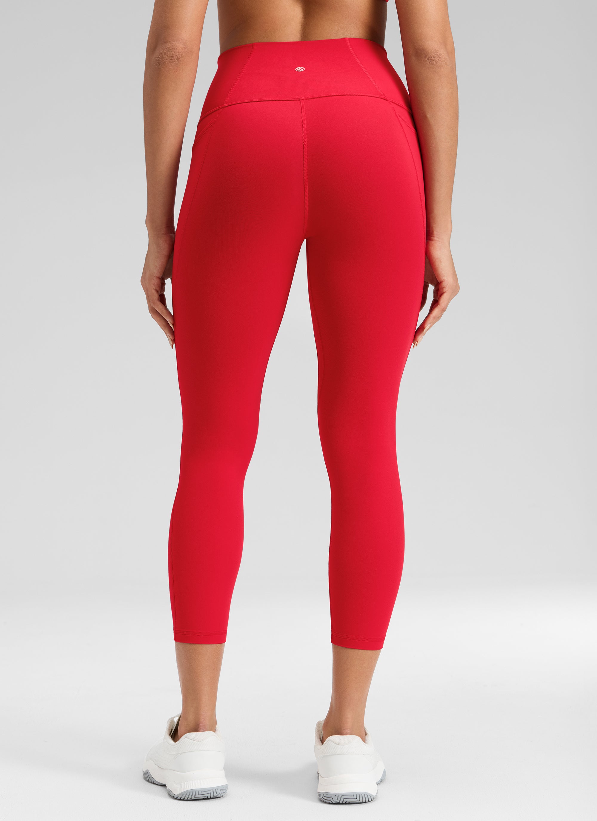 CRZ YOGA - ليغينغز نسائي بخصر Butterluxe وجيوب Butterluxe ط Butterluxe بطول كابري 23 بوصة، لون أحمر أورورا