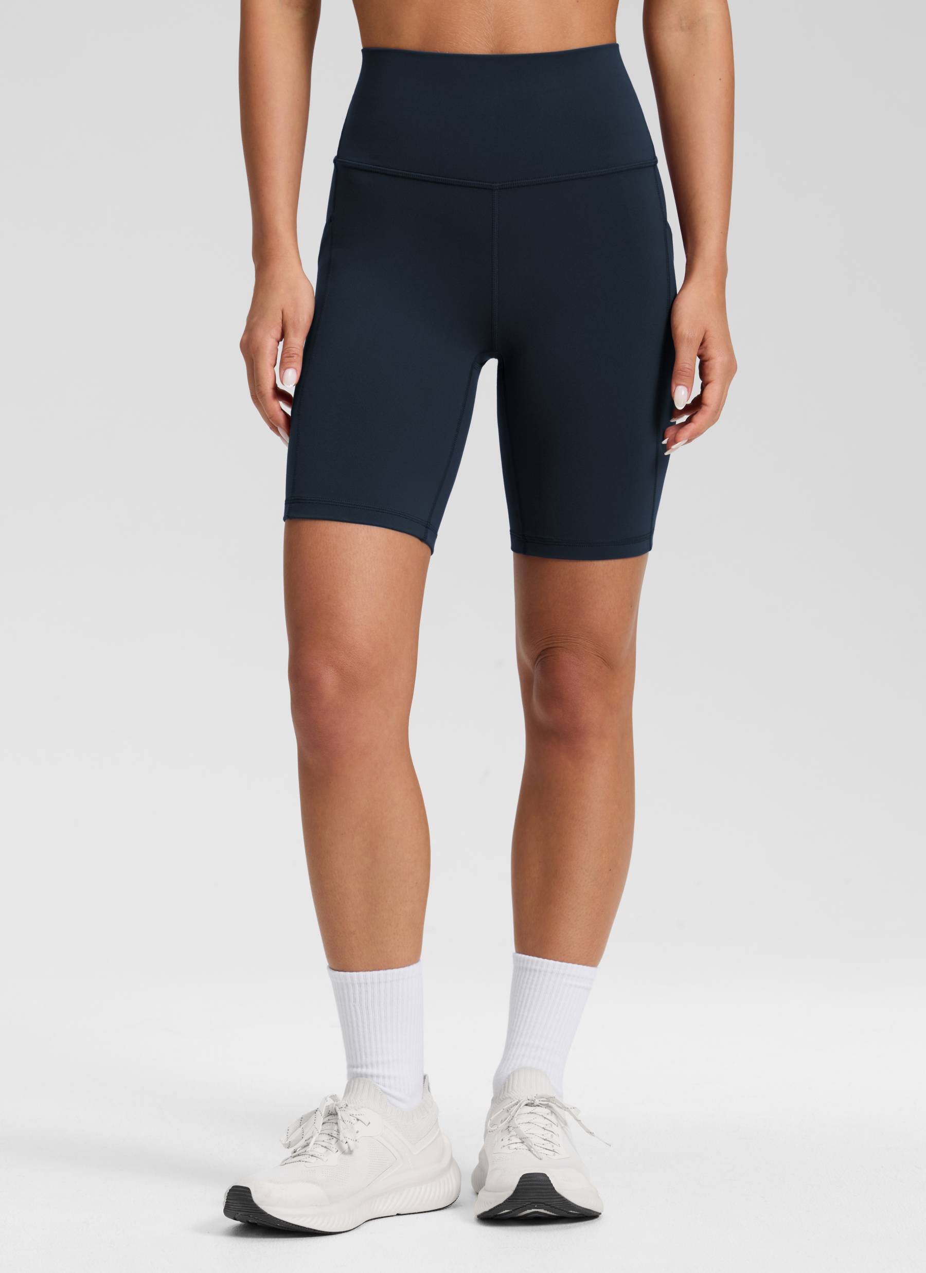 شورت يوغا نسائي من CRZ YOGA بخصر مرتفع وتصميم بايكر Butterluxe بطول 8 بوصات، لون أزرق داكن أصلي