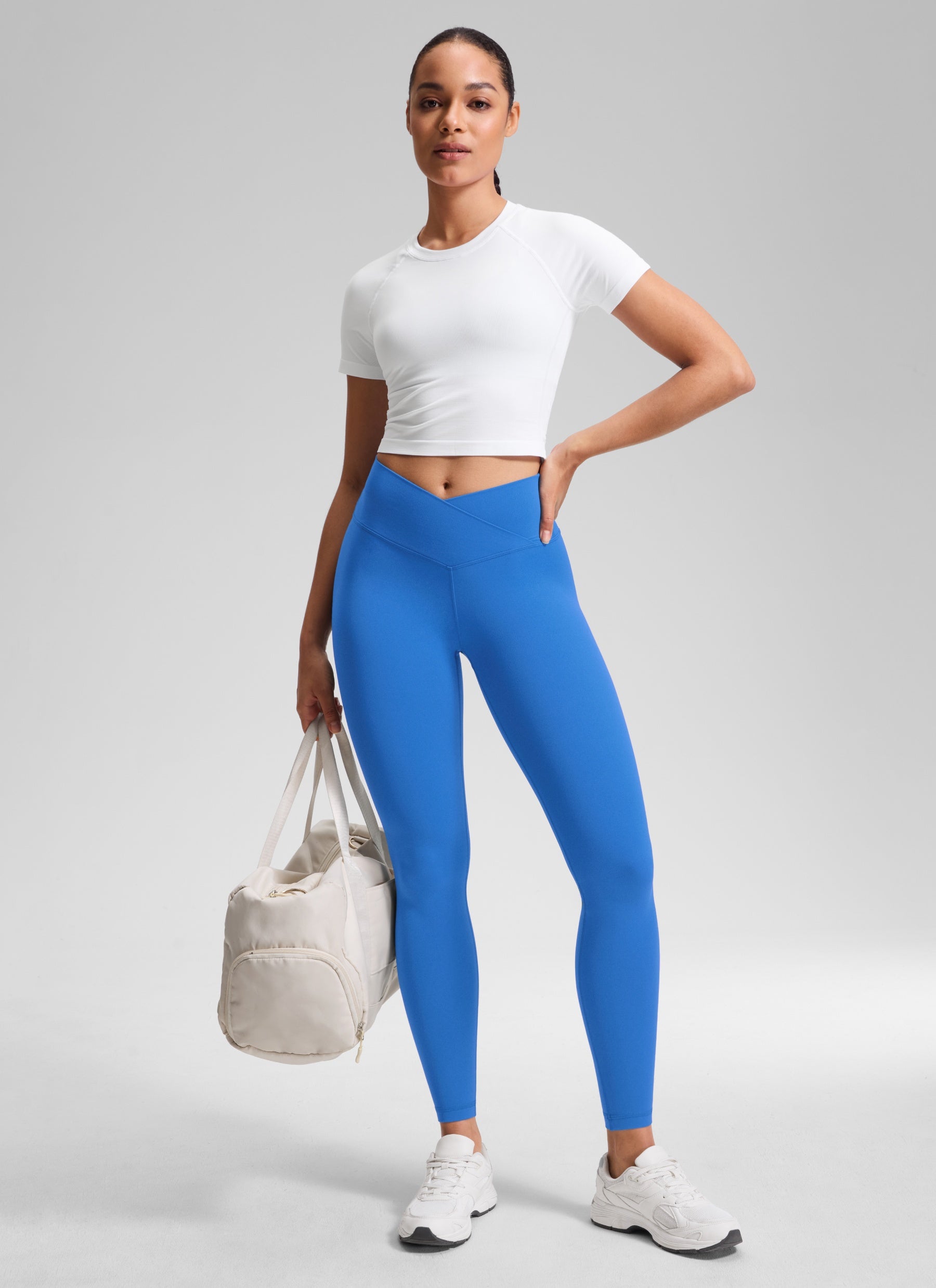 بنطلون ضيق يوغا Butterluxe بخصر مرتفع للنساء من CRZ YOGA، بطول 71 سم، بتصميم خصر متقاطع على شكل حرف V، أزرق لامع