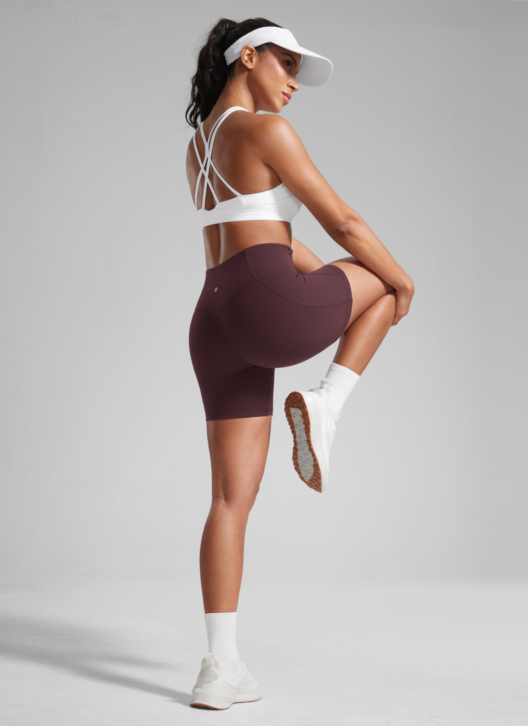 CRZ YOGA شورت راكب الدراجة نسائي Butterlift بتصميم مزموم للمؤخرة وبدون خياطة أمامية بجيوب 13 سم لون البرقوق الناضج