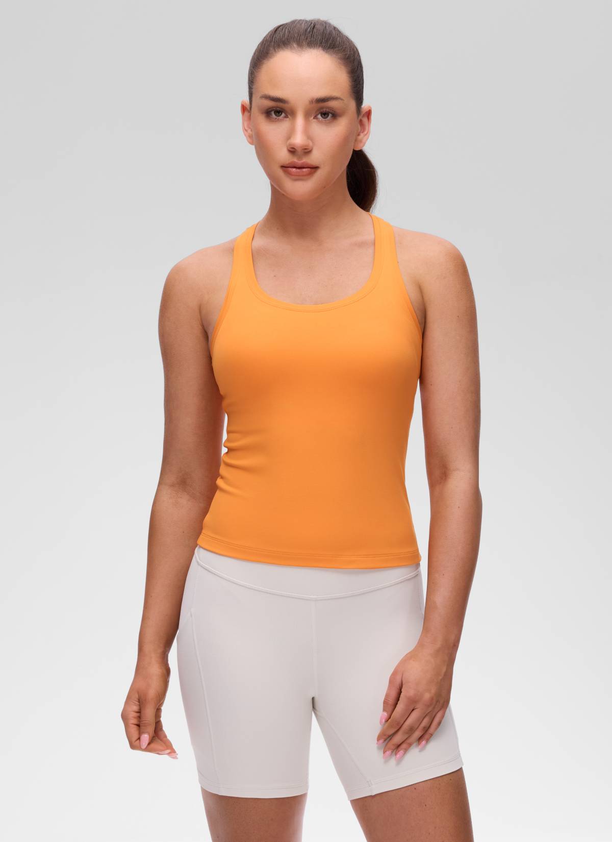 CRZ YOGA توب تانك نسائي لليوغا بقصة ضيقة وياقة دائرية وتصميم ريسر باك من Butterluxe بلون برتقالي تايجر