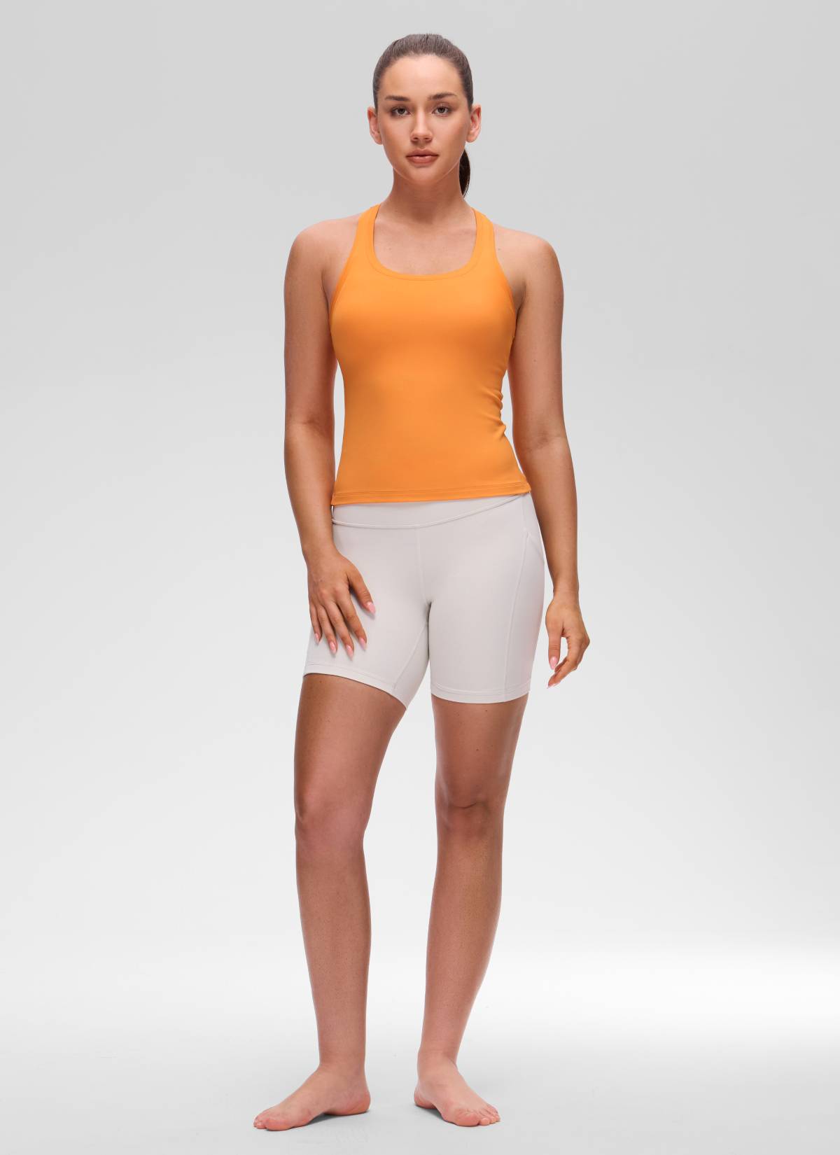 CRZ YOGA توب تانك نسائي لليوغا بقصة ضيقة وياقة دائرية وتصميم ريسر باك من Butterluxe بلون برتقالي تايجر