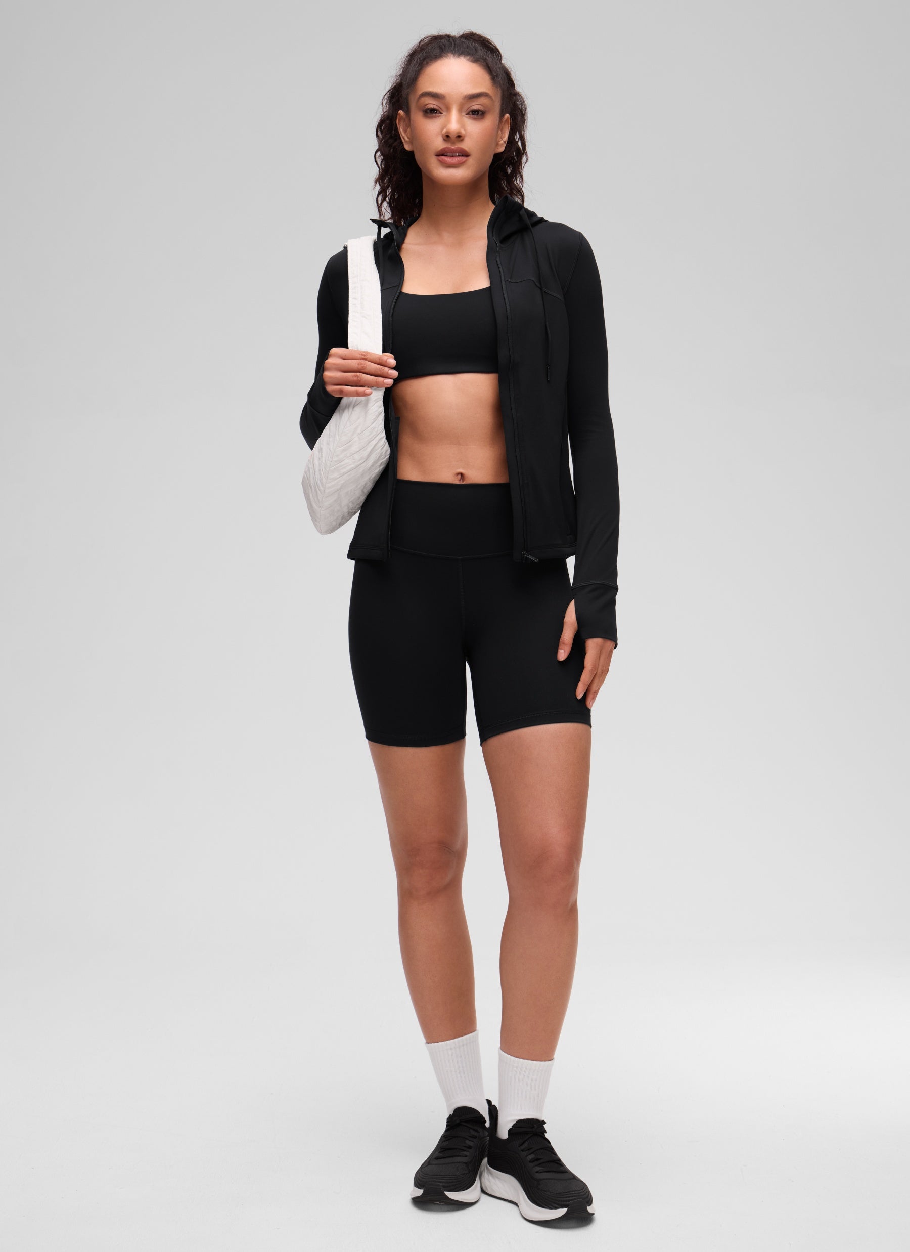 هوديز CRZ YOGA نسائي Butterluxe بقصة ضيقة وجيوب بسحاب كامل أسود