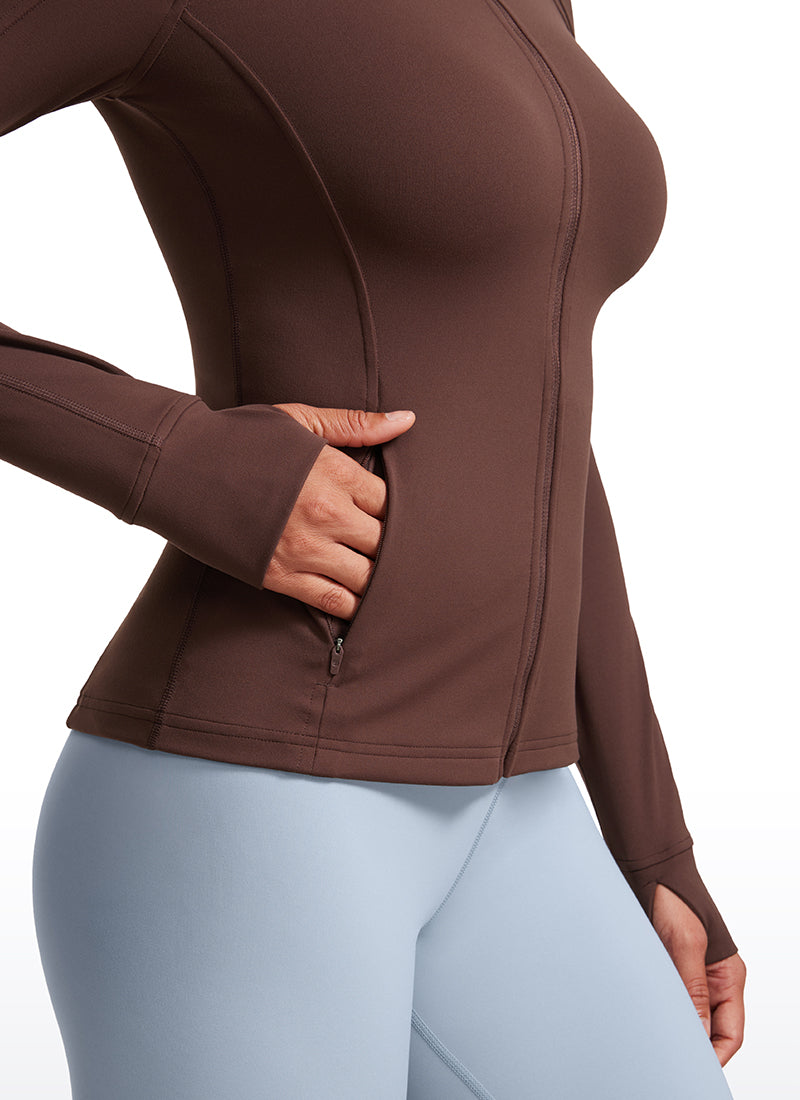 CRZ YOGA - قمصان يوغا نسائية بقصة ضيقة من قماش Butterluxe بسحاب Butterluxe وأكمام طويلة بلون تاوبي