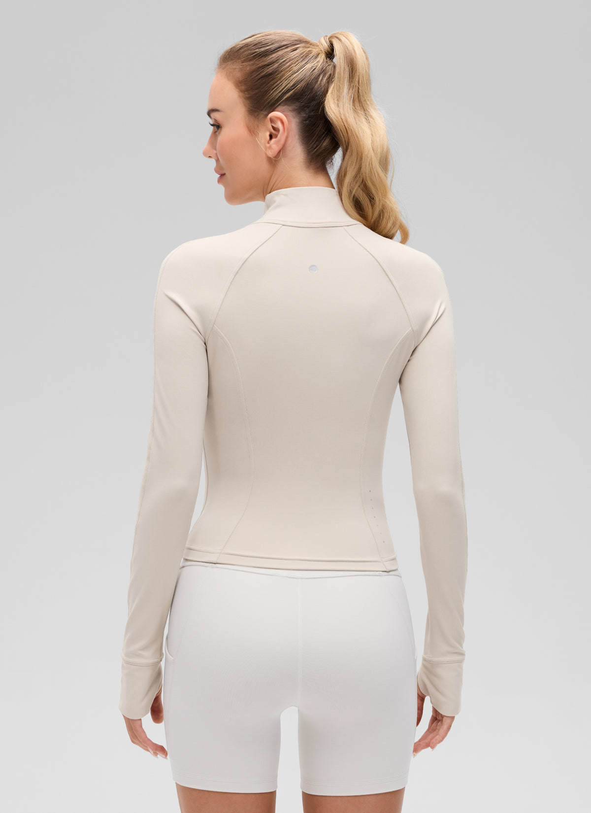 CRZ YOGA Women's Butterluxe Cropped Pocket Outerwear Full Zip Jackets Mojave Tan @model_info:Anna