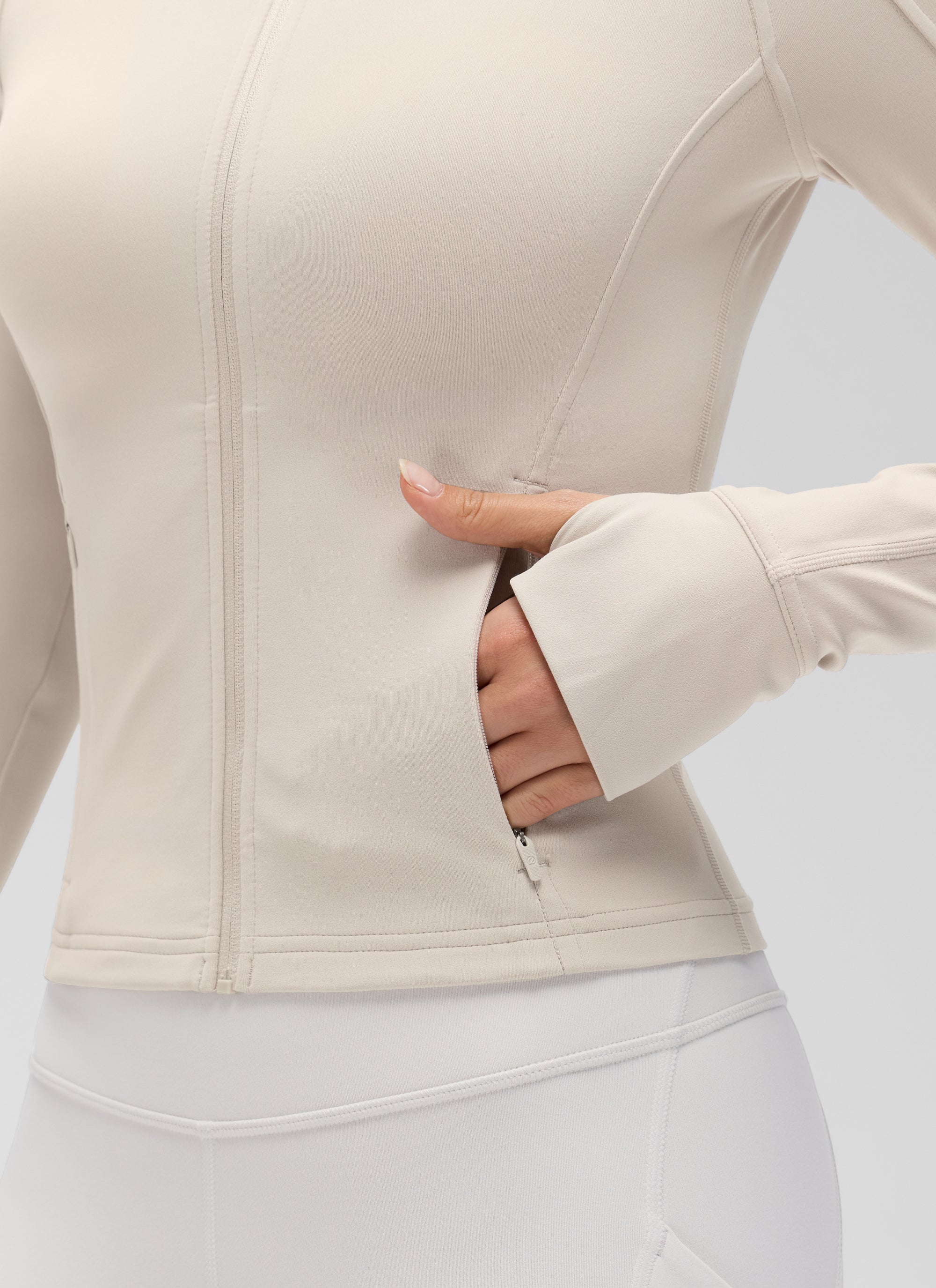 CRZ YOGA Women's Butterluxe Cropped Pocket Outerwear Full Zip Jackets Mojave Tan @model_info:Anna