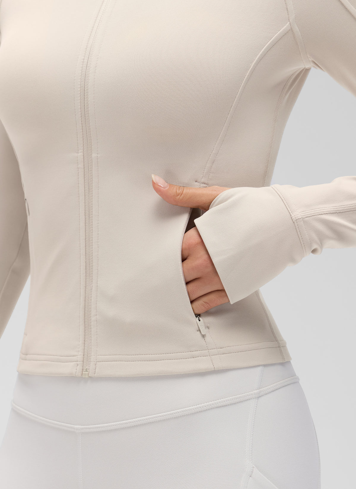 CRZ YOGA Women's Butterluxe Cropped Pocket Outerwear Full Zip Jackets Mojave Tan @model_info:Anna