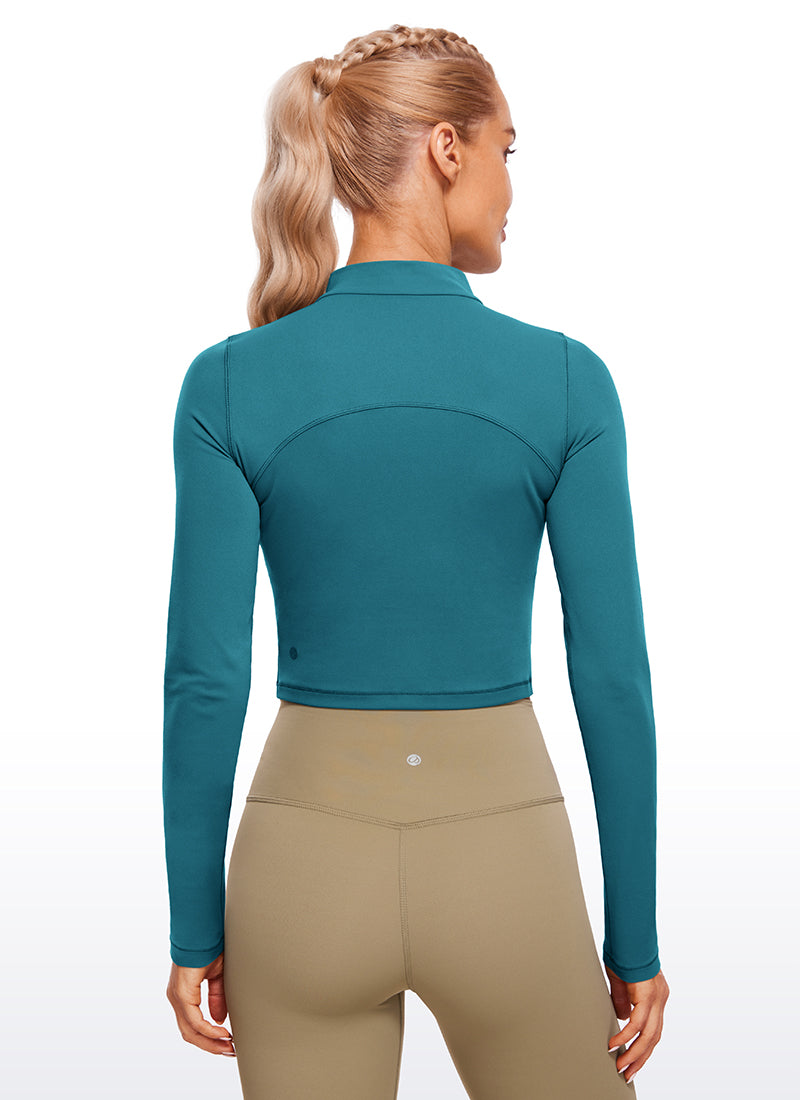 بلوزة نسائية بقصة ضيقة من Butterluxe لليوجا، قصيرة بأكمام طويلة وياقة وهمية مرتفعة من CRZ YOGA بلون أخضر بورياليس