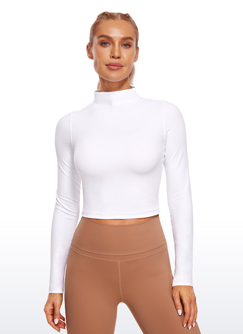 بلوزة نسائية بقصة ضيقة من Butterluxe لليوجا، قصيرة بأكمام طويلة وياقة وهمية مرتفعة من CRZ YOGA بلون أبيض